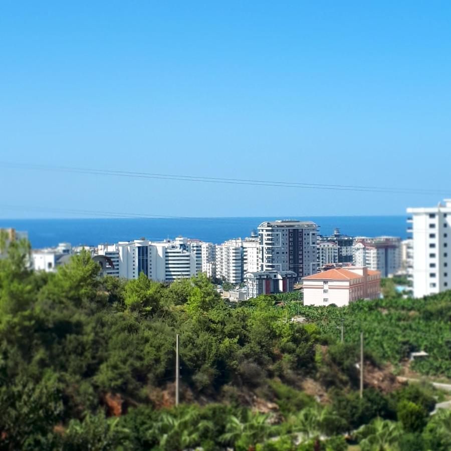 Azura Park -- шикарное место для вас -- вид на море, на бассейн, горный воздух и свой пляж - забронируйте сейчас Daire Alanya
